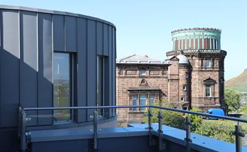 Image of the Royal Observatory Edinburgh with the HIggs Centre for Innovation in the forground.