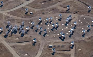 Aerial photo of the ALMA observatory in the desert in Chile.